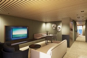 Cruiseschip-Norwegian Cruise Line-NCLPrima-Hutcategorie-The_Haven_Owner's_Suite_met groot balkon-Living-cat. H5